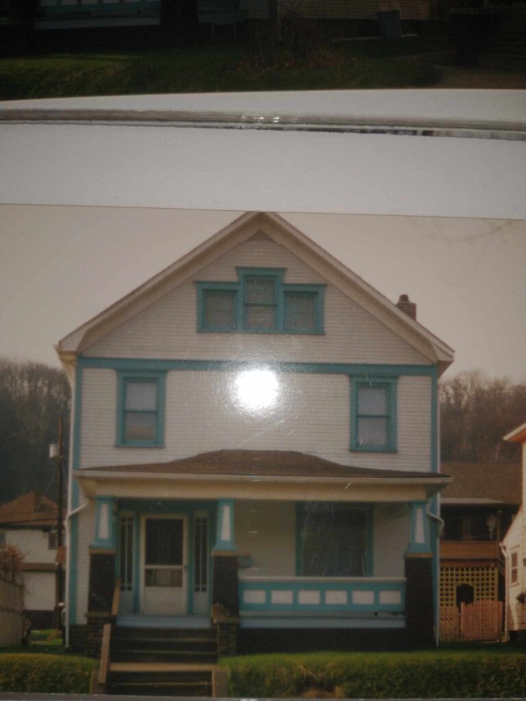 A house with blue trim captured